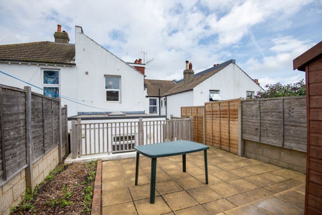 A Well-Maintained Private Garden Area Featuring A ...