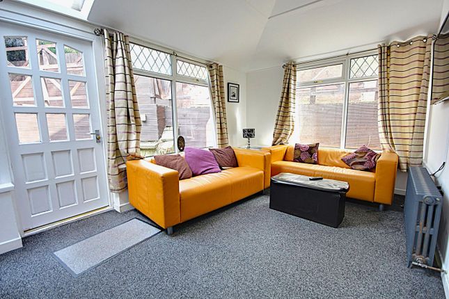 A Bright And Inviting Large Modern Living Room, Pe...