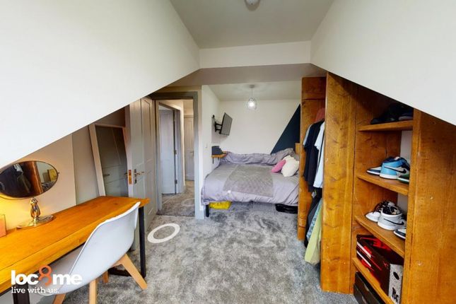 A Stylish And Cozy Double Bedroom Featuring A Comf...