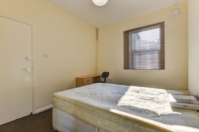 A Bright And Tidy Double Bedroom Featuring A Comfo...
