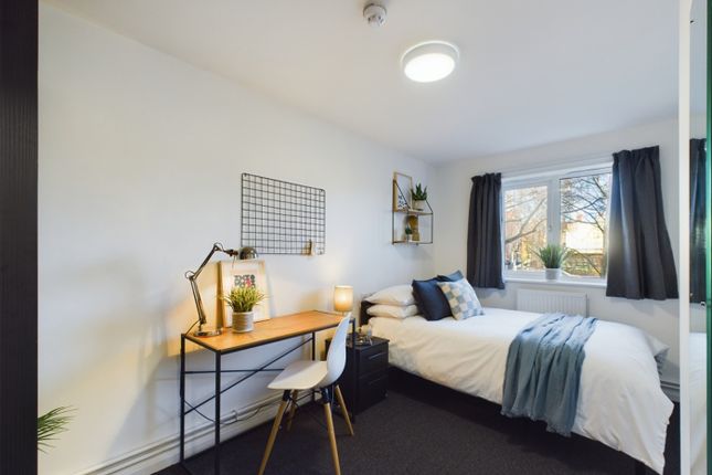 A Bright And Inviting Double Bedroom With A Stylis...