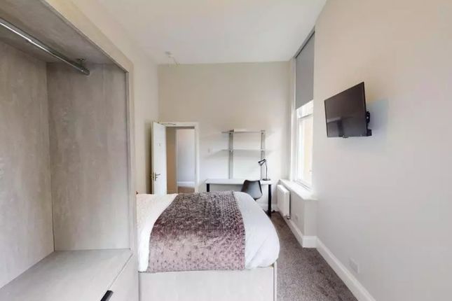 A Bright And Inviting Double Bedroom Featuring Mod...