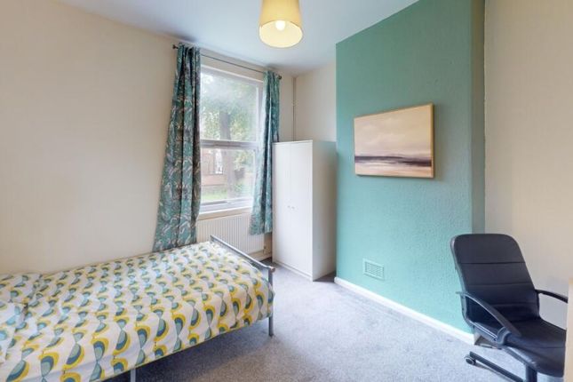 Bright And Cozy Single Bedroom Featuring A Comfort...