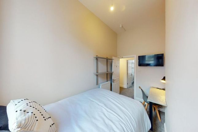A Bright And Tidy Double Bedroom With A Comfortabl...
