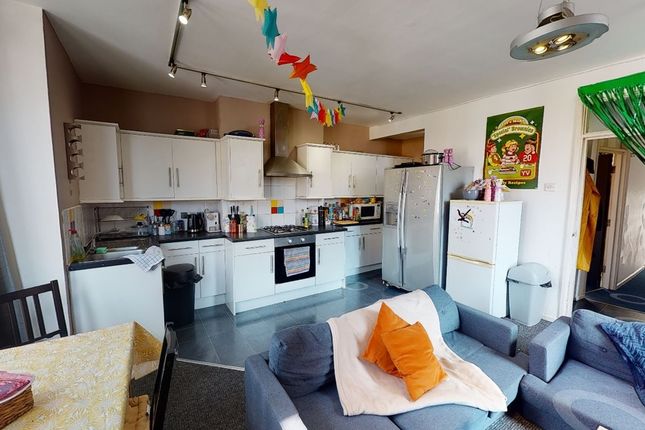 A Spacious And Bright Kitchen With Modern Applianc...