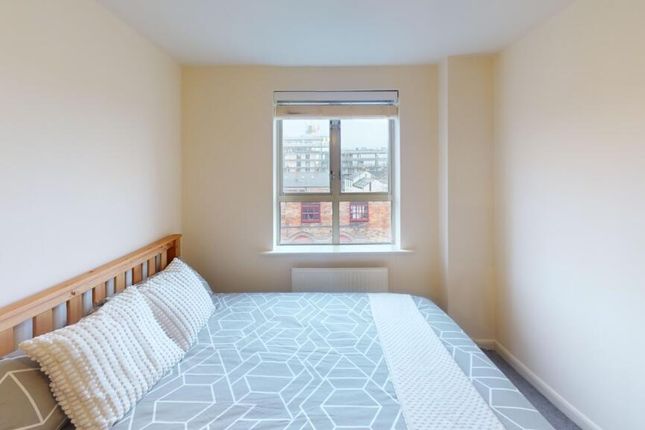A Bright And Tidy Double Bedroom Featuring A Large...