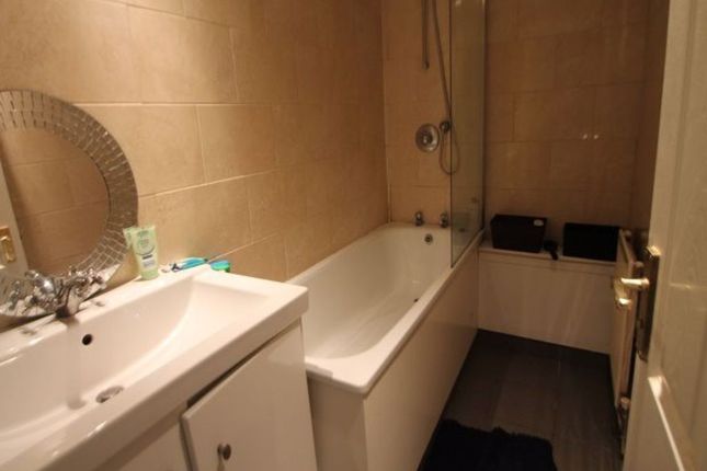 A Spacious And Well-Maintained Bathroom Featuring ...