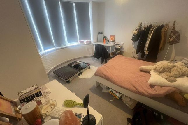 A Cozy Double Bedroom With A Comfortable Bed And A...