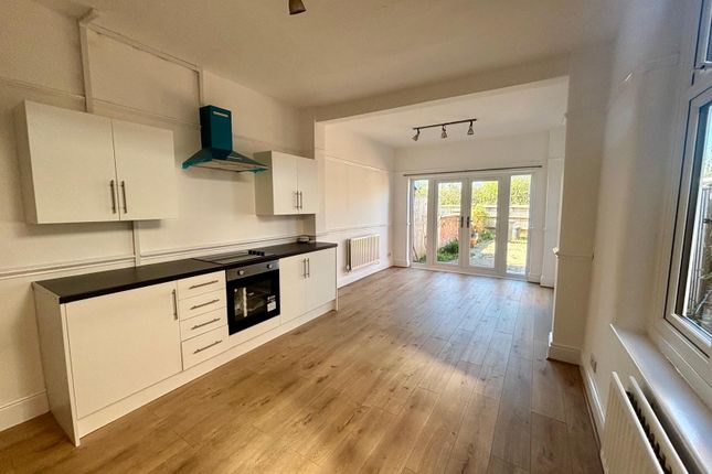 A Three Bedroom Mid Terraced House