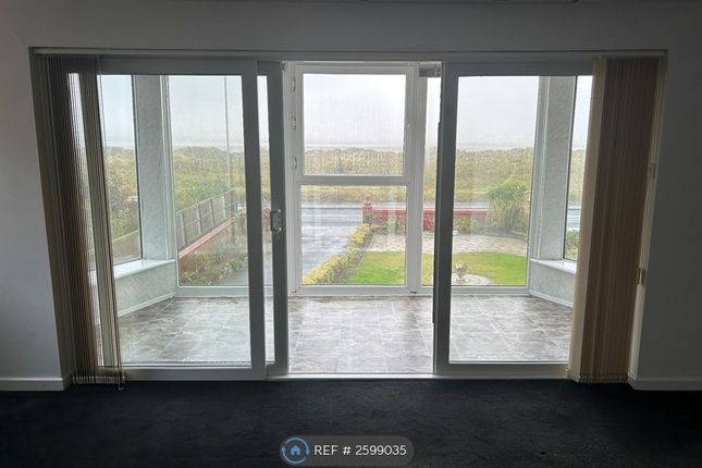 Lounge Area Leading To Balcony With Sea Views.