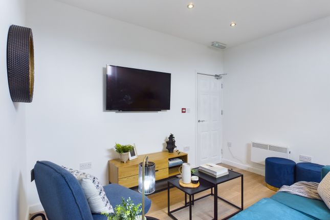 A Bright And Inviting Large Modern Living Room, Pe...