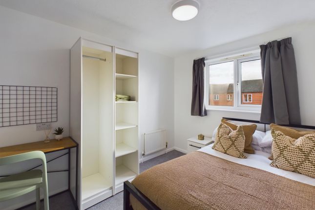 A Bright And Inviting Double Bedroom With Modern d...