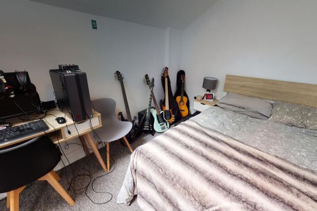 Cozy Double Bedroom Featuring A Comfortable Bed, A...