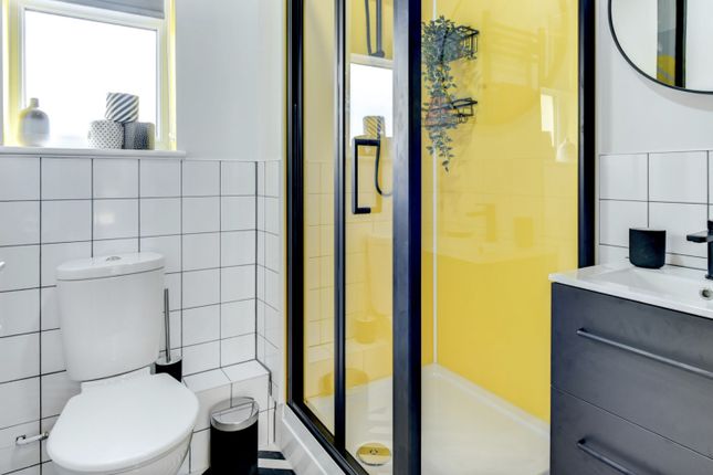 A Stylish And Modern Bathroom Featuring A Sleek De...