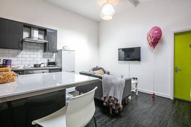 Bright Open-Plan Kitchen And Lounge With Modern Da...