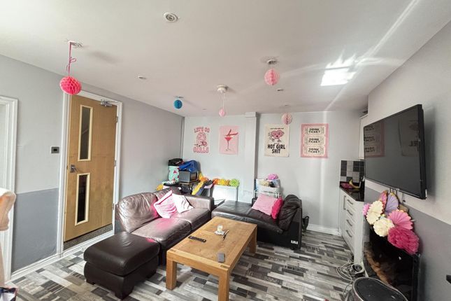 A Bright And Modern Living Room Featuring A Large ...