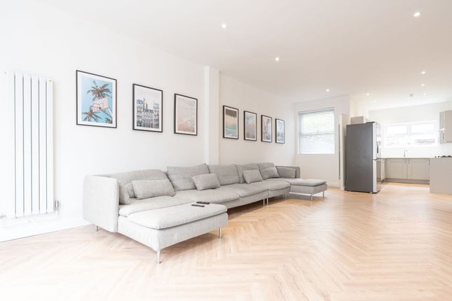 Bright, Modern Open-Plan Living Area With A Long G...