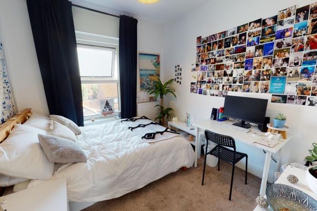 A Bright And Cozy Double Bedroom Featuring A Comfo...