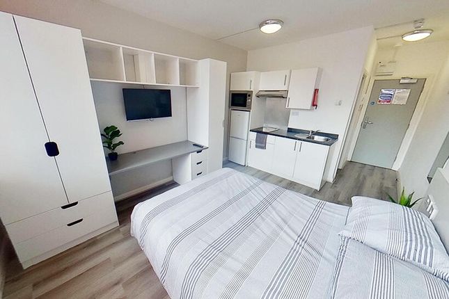 Bright And Modern Double Bedroom Featuring A Comfo...