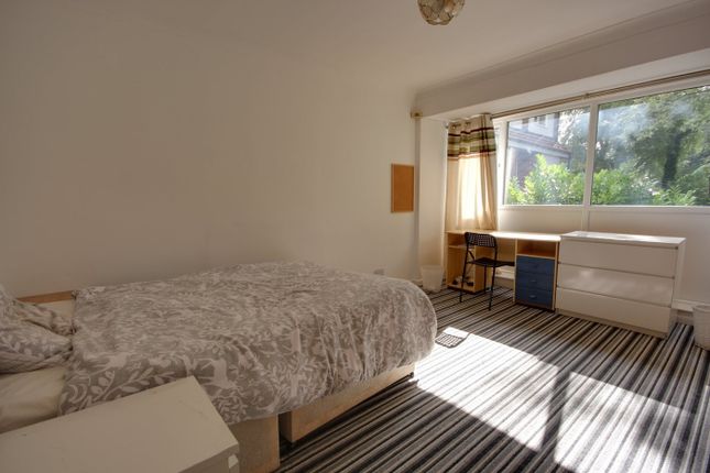 A Spacious And Bright Double Bedroom Featuring A c...