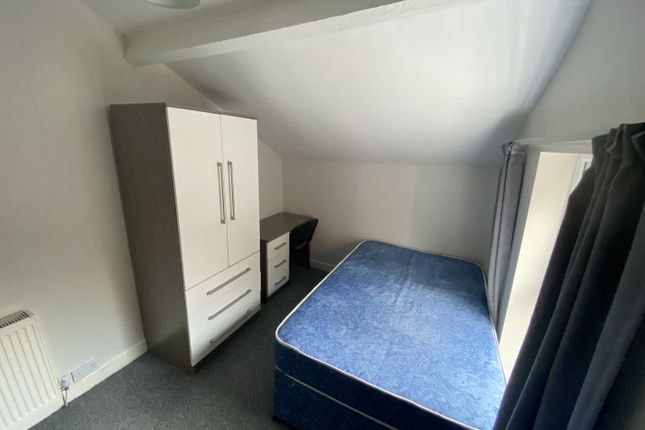 Cozy Double Bedroom Featuring A Comfortable Bed, m...