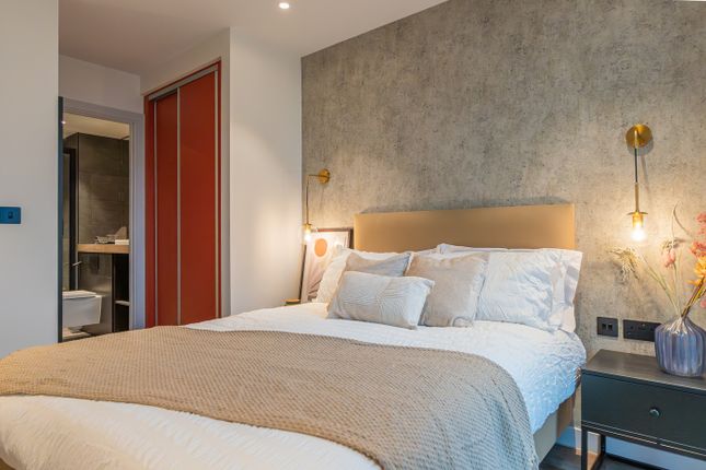 A Stylish And Inviting Double Bedroom Featuring Mo...