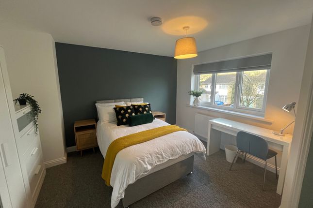 A Beautifully Designed Double Bedroom Featuring A ...