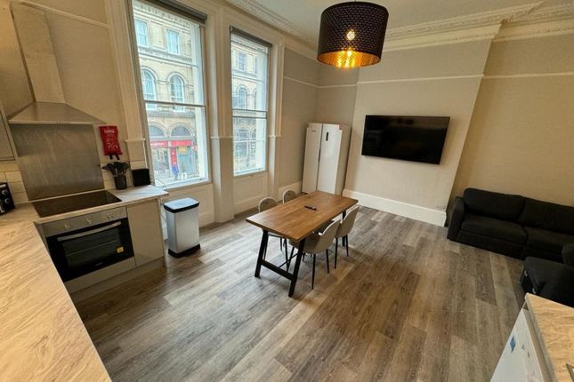 A Spacious And Inviting Large Modern Living Room W...