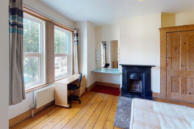 Bright And Inviting Master Bedroom Featuring A Lar...