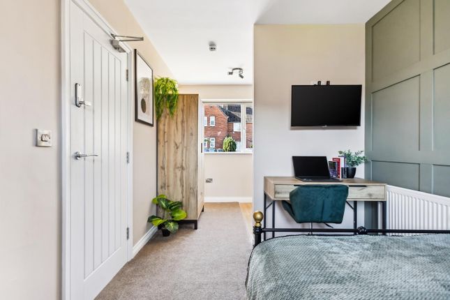This Inviting Double Bedroom Features Ample Natura...