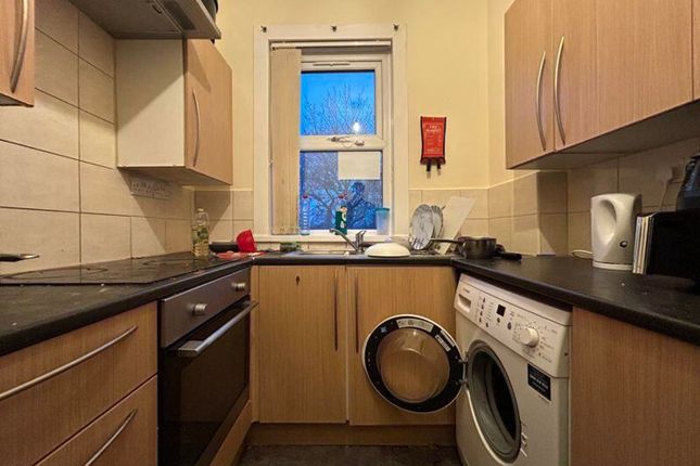 A Cozy Kitchenette With Essential Appliances, Perf...