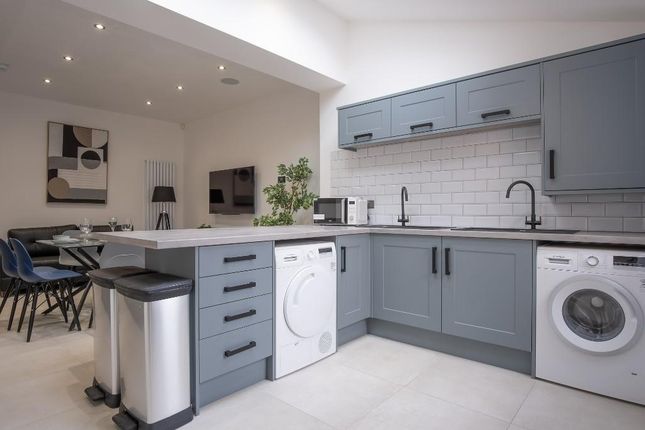 Bright And Modern Kitchen With Ample Counter Space...