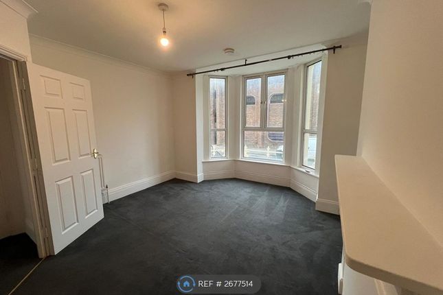Bedroom With Large Bay Window