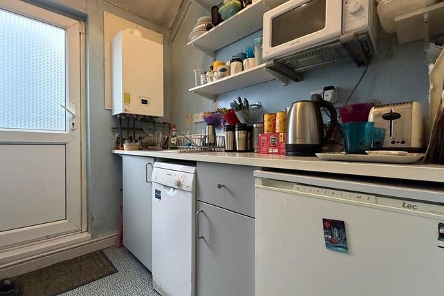 Bright, Well-Equipped Kitchen With Practical Workt...