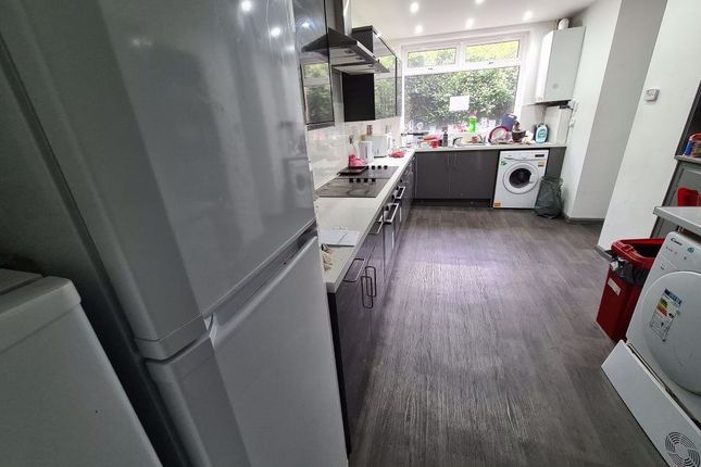 Bright And Modern Kitchen Featuring Ample Countert...