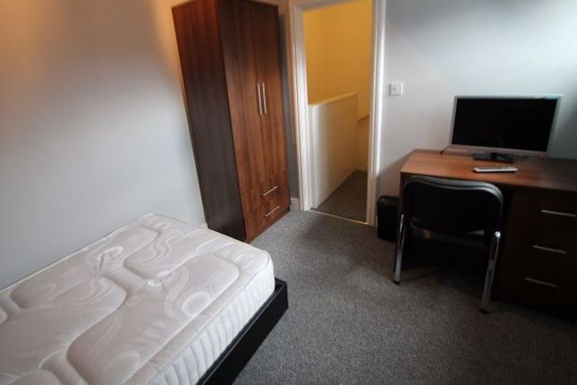 A Neat And Functional Single Bedroom Featuring A c...
