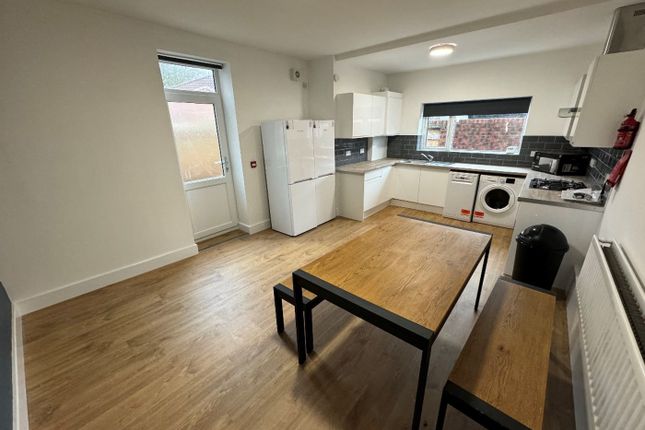 A Modern Kitchen Featuring Ample Space For Meal Pr...