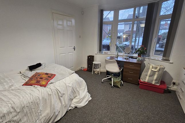 A Bright And Welcoming Master Bedroom Featuring A ...