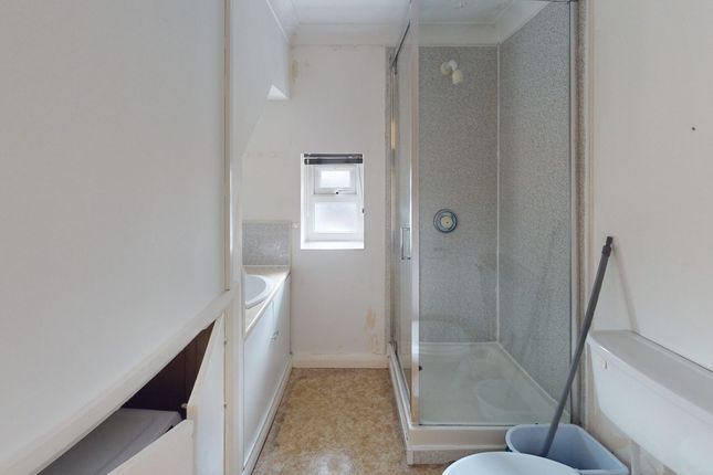 A Tidy Bathroom Featuring Both A Bath And A Shower...