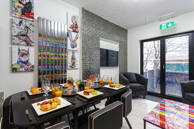 A Vibrant And Spacious Modern Living Room, Perfect...