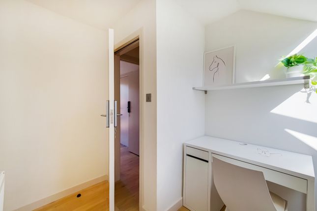 A Bright And Well-Maintained Bedroom Featuring A S...