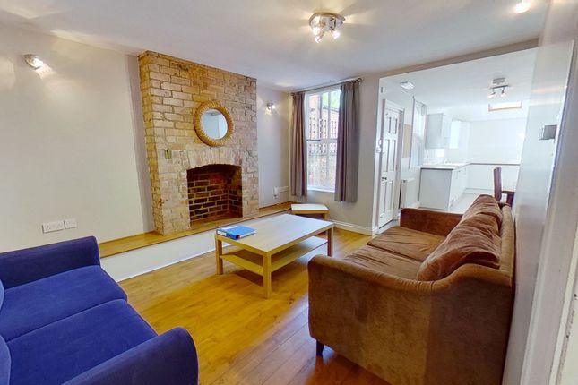 Bright, Modern Living Room With Exposed Brick Fire...