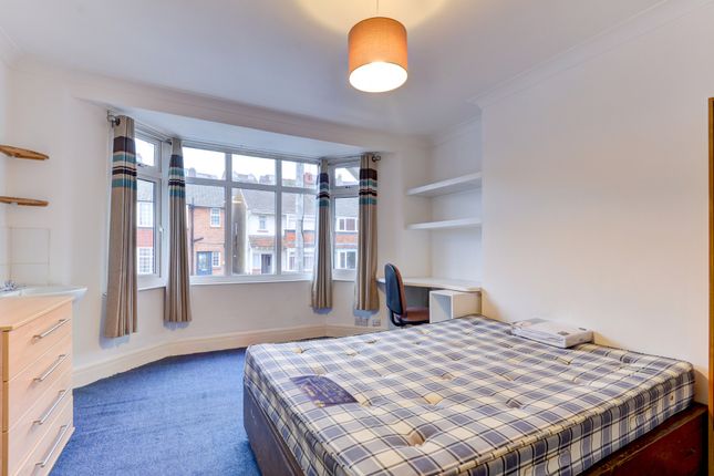 A Bright And Inviting Double Bedroom With Large Wi...