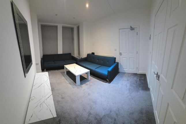 A Spacious, Modern Living Room Featuring Contempor...