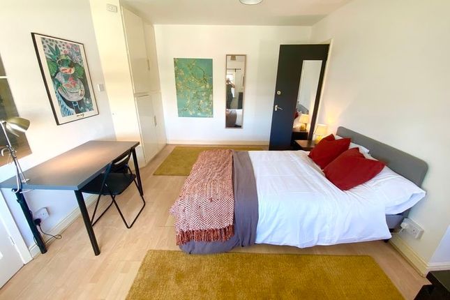 Bright And Spacious Master Bedroom Featuring A Com...