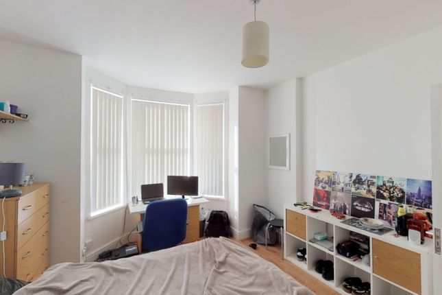 Bright And Airy Master Bedroom Featuring A Large B...