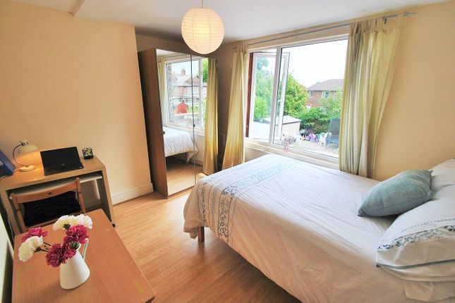 This Inviting Double Bedroom Features Ample Natura...