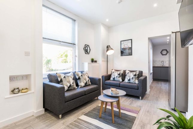 Bright, Modern Living Room With Two Comfortable So...