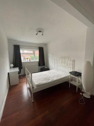 A Bright And Inviting Double Bedroom Featuring A c...