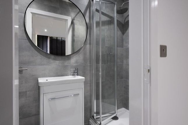 Modern Bathroom Featuring A Shower Enclosure And A...